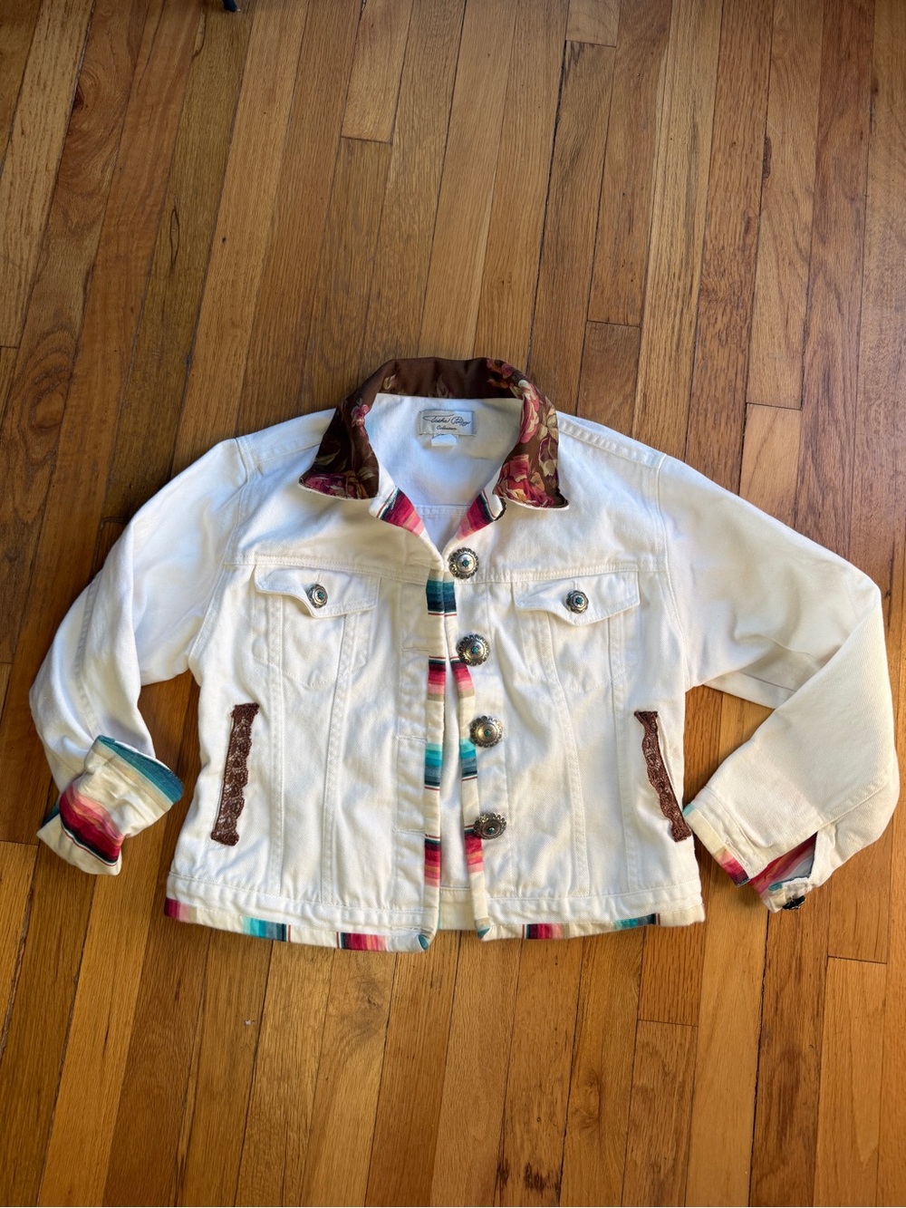 Tasha polizzi white denim jacket with floral and stripe accents